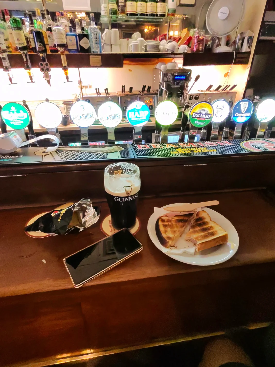 pint, crisps and toastie in grogans pub dublin